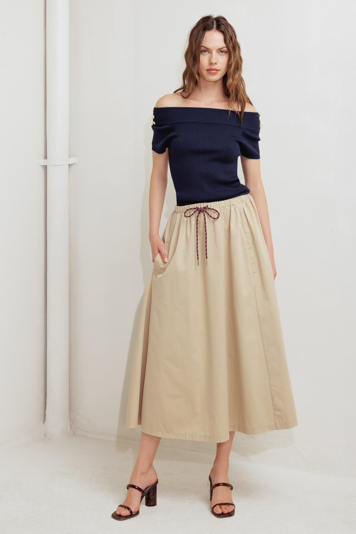 Model wearing the Flying Tomato Weekend Parisian Woven Midi Skirt, showcasing its comfortable fit and versatile Parisian styl