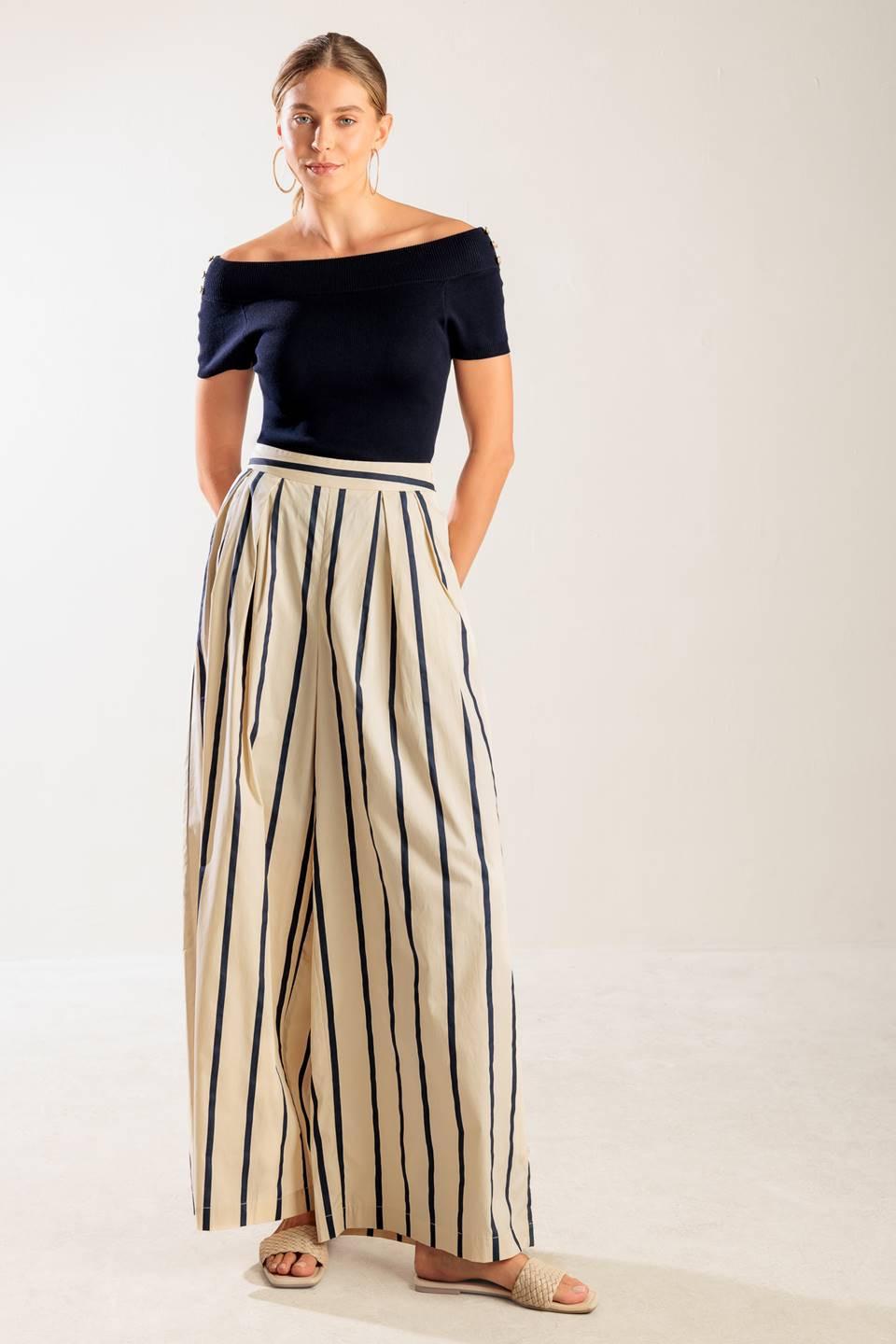 Flying Tomato HERE AND NOW WOVEN PANTS, full view on a model, showcasing the relaxed fit and natural-toned fabric. Perfect fo