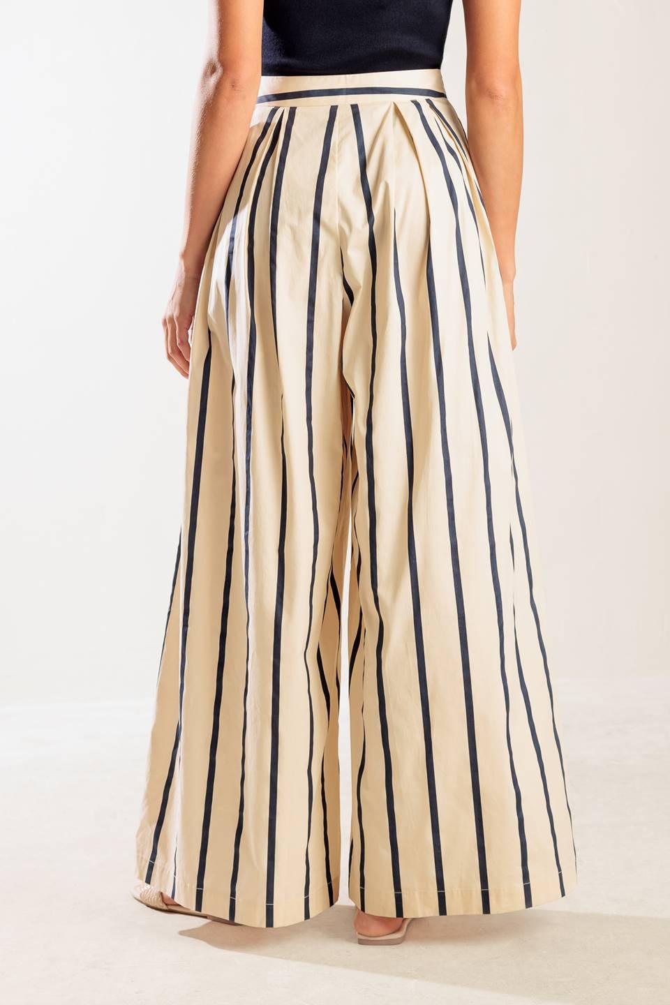 Flying Tomato HERE AND NOW WOVEN PANTS, side profile on a model, highlighting the comfortable, flowing woven fabric and moder