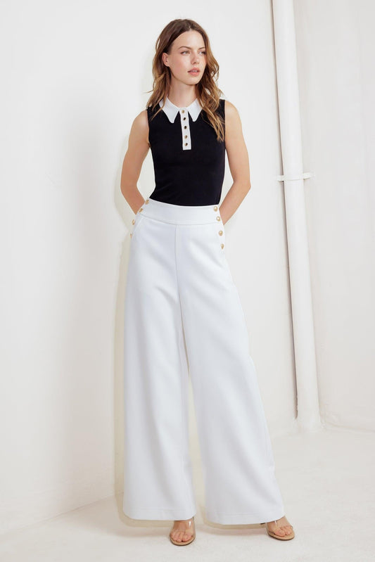 Flying Tomato BETTER THAN EVER WOVEN PANTS shown from the front on a model. The stylish, high-waisted woven trousers.