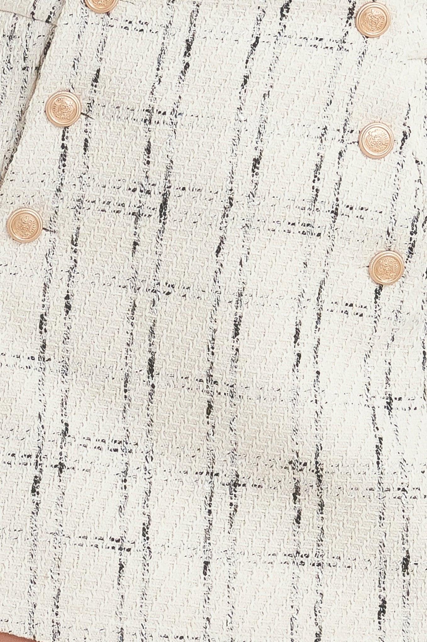 Flying Tomato PARIS BOUND WOVEN TWEED SKORT, a complete view of this stylish and high-quality woven tweed garment.
