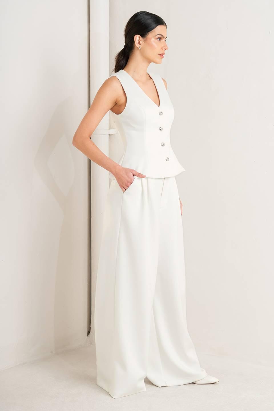 Flying Tomato PURE ELEGANCE WOVEN PANTS, folded neatly, displaying the fabric's drape and the garment's quality.