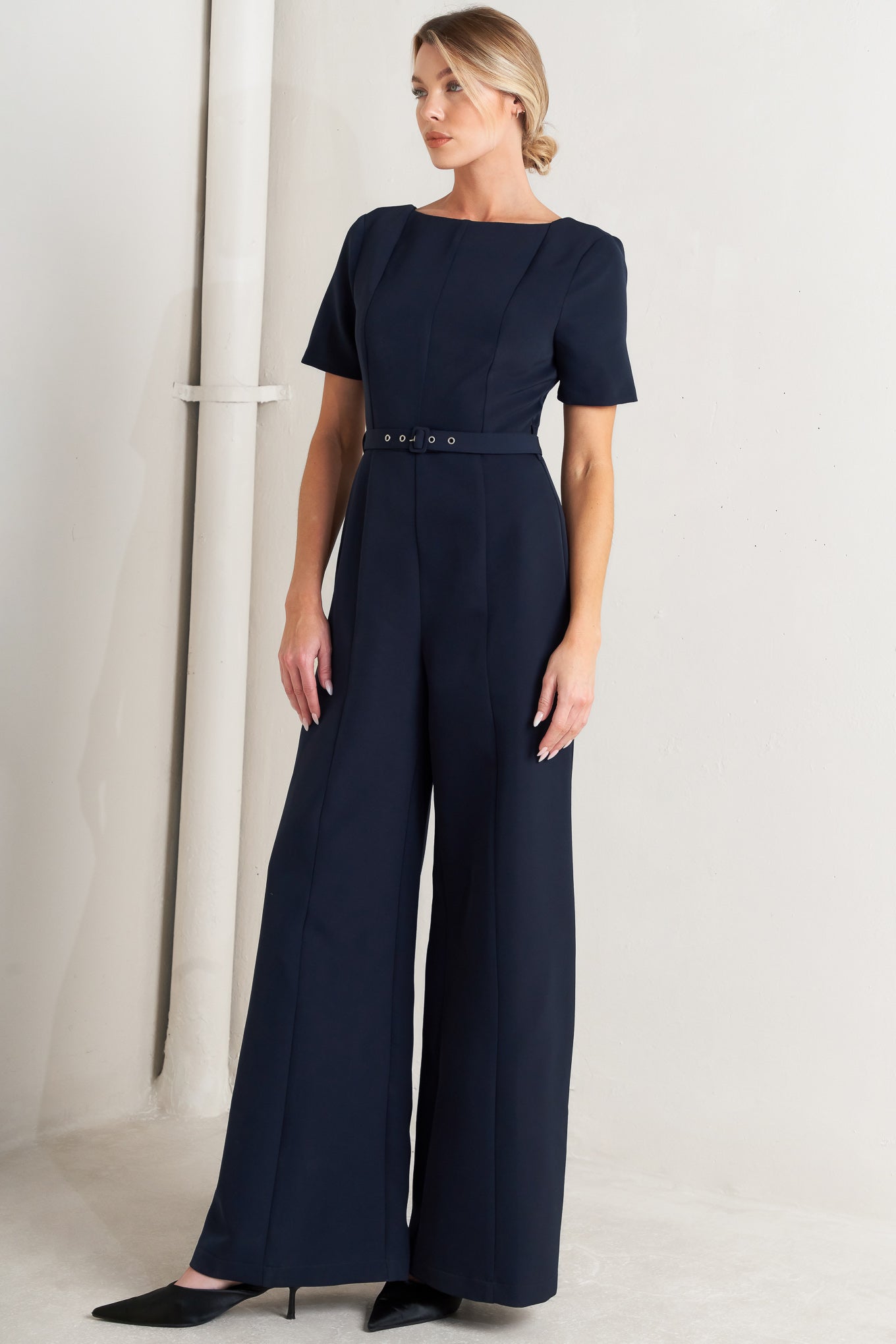 Flying Tomato Forever Flattering Navy Woven Jumpsuit fabric detail, emphasizing the quality and soft texture.