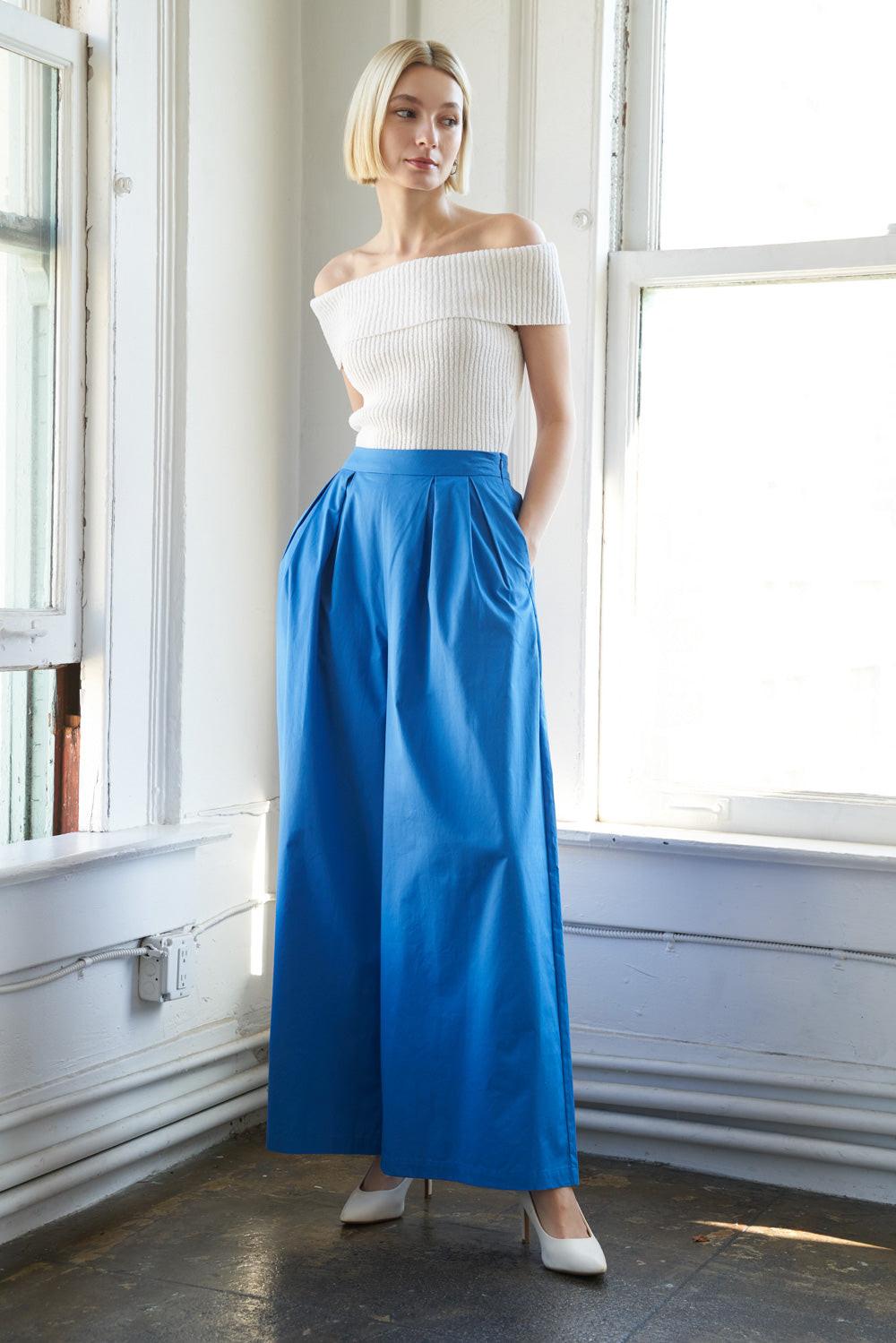 Flying Tomato Precious Approach Shoulder Top styled for a modern look, emphasizing its comfortable and elegant fit.