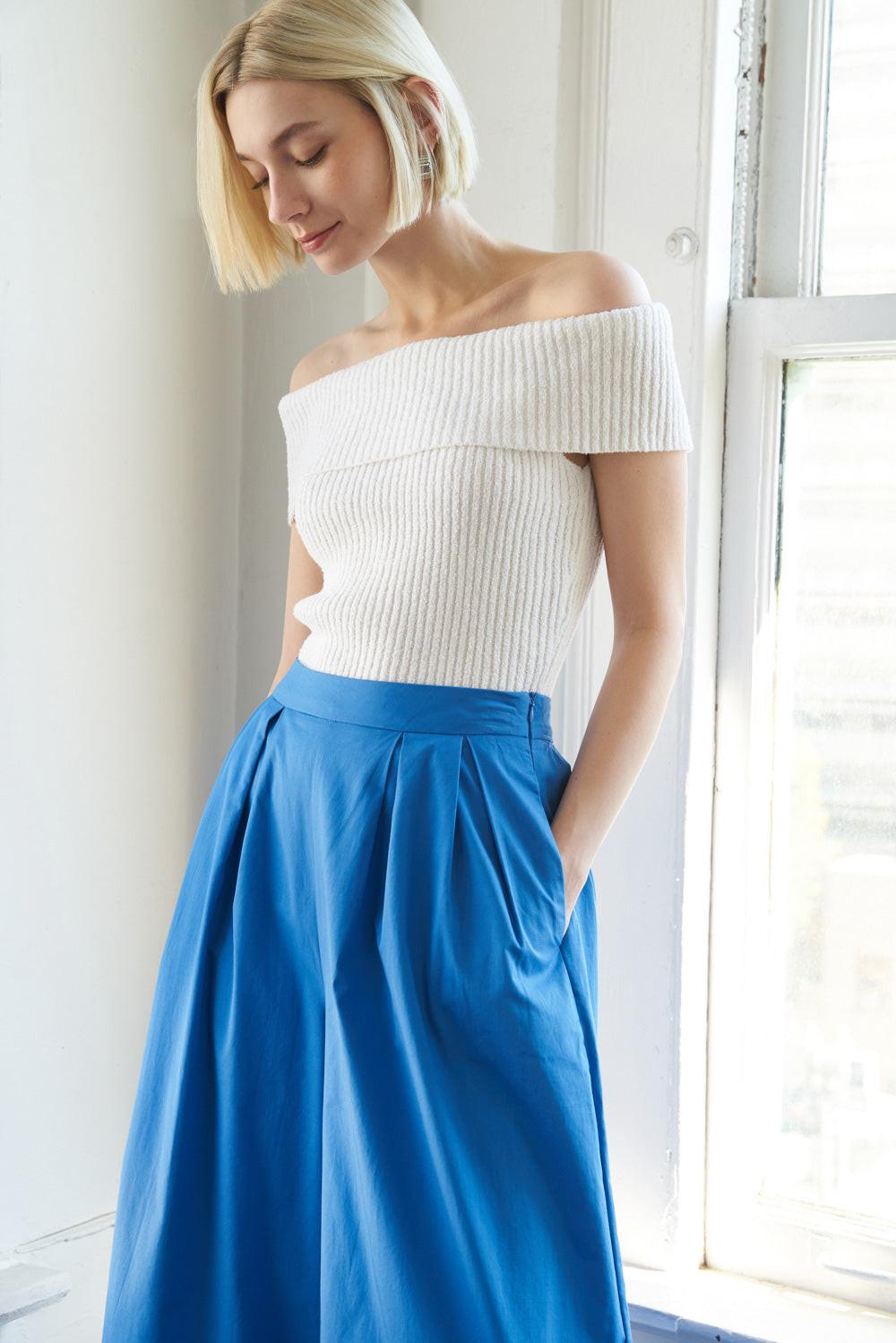 Model wearing the Flying Tomato Precious Approach Shoulder Top, demonstrating its chic style and versatile appeal.