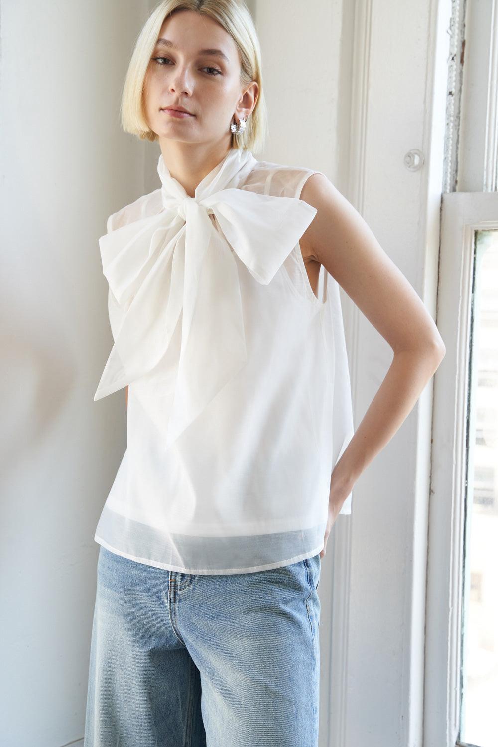 Close-up of the Flying Tomato Shine For Us Organza Top, highlighting its luxurious sheer organza texture.