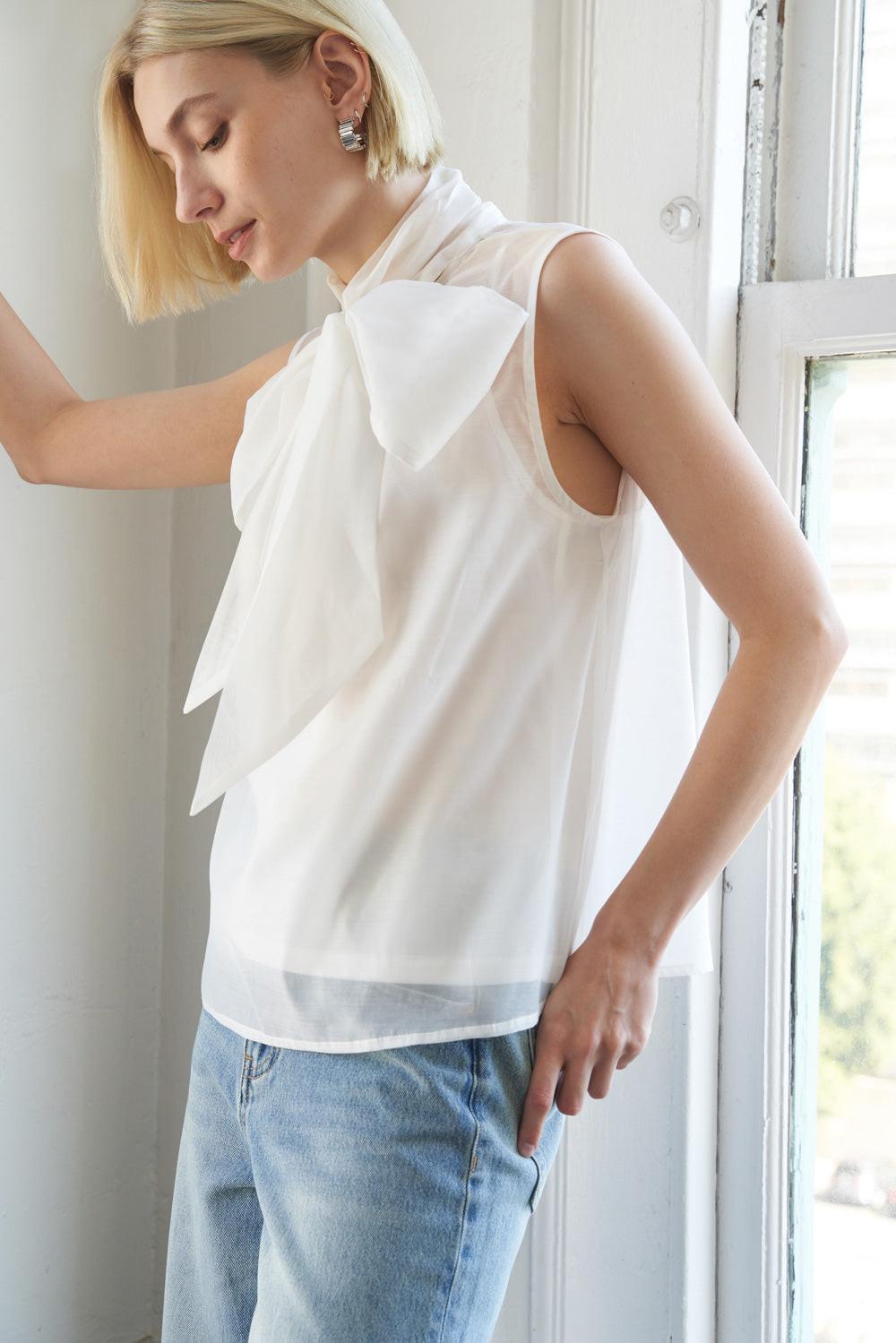 Flying Tomato Shine For Us Organza Top, featuring its refined hemline and sophisticated design for quality apparel.