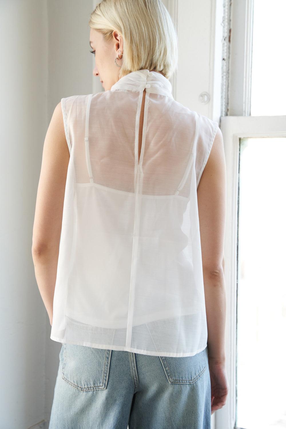 Back view of the Flying Tomato Shine For Us Organza Top, revealing its elegant sheer silhouette and design.