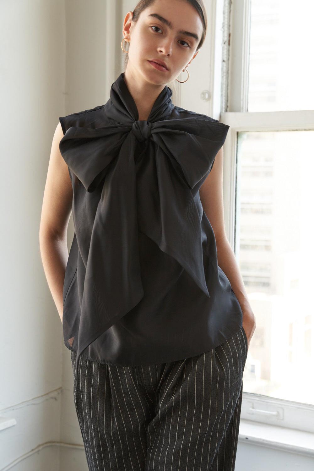 Flying Tomato Shine For Us Organza Top, capturing its sophisticated appeal as a quality garment for women's fashion.