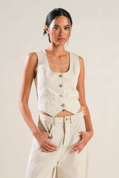 Sophisticated Twill Button Vest in beige with button-down closure, styled with matching high-waisted pants.