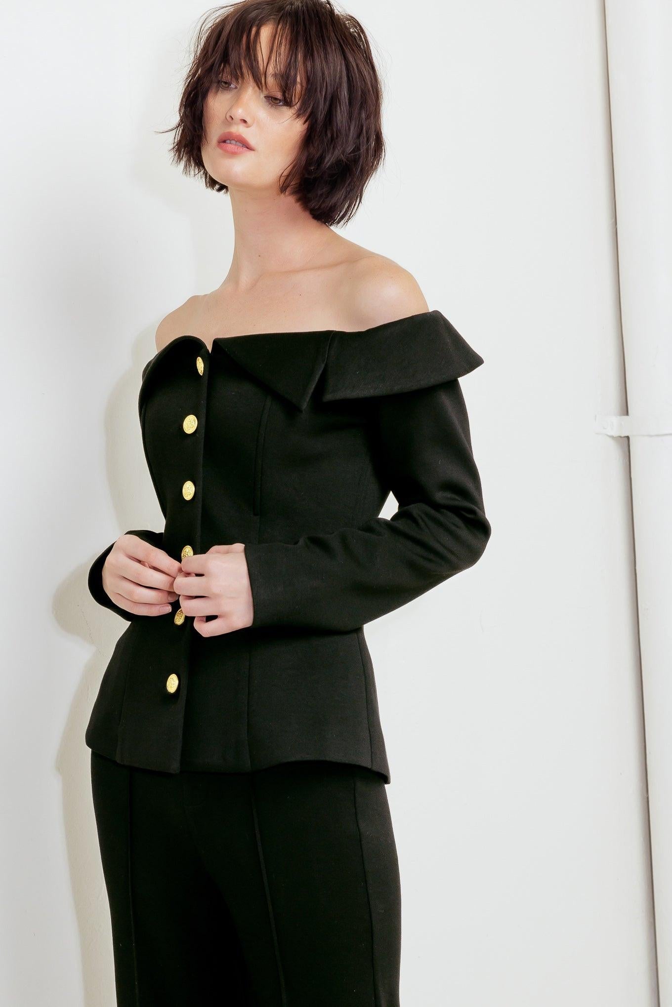 Model wearing the Flying Tomato Modern Flow Black Woven Top, styled for a chic casual look, perfect for everyday fashion.