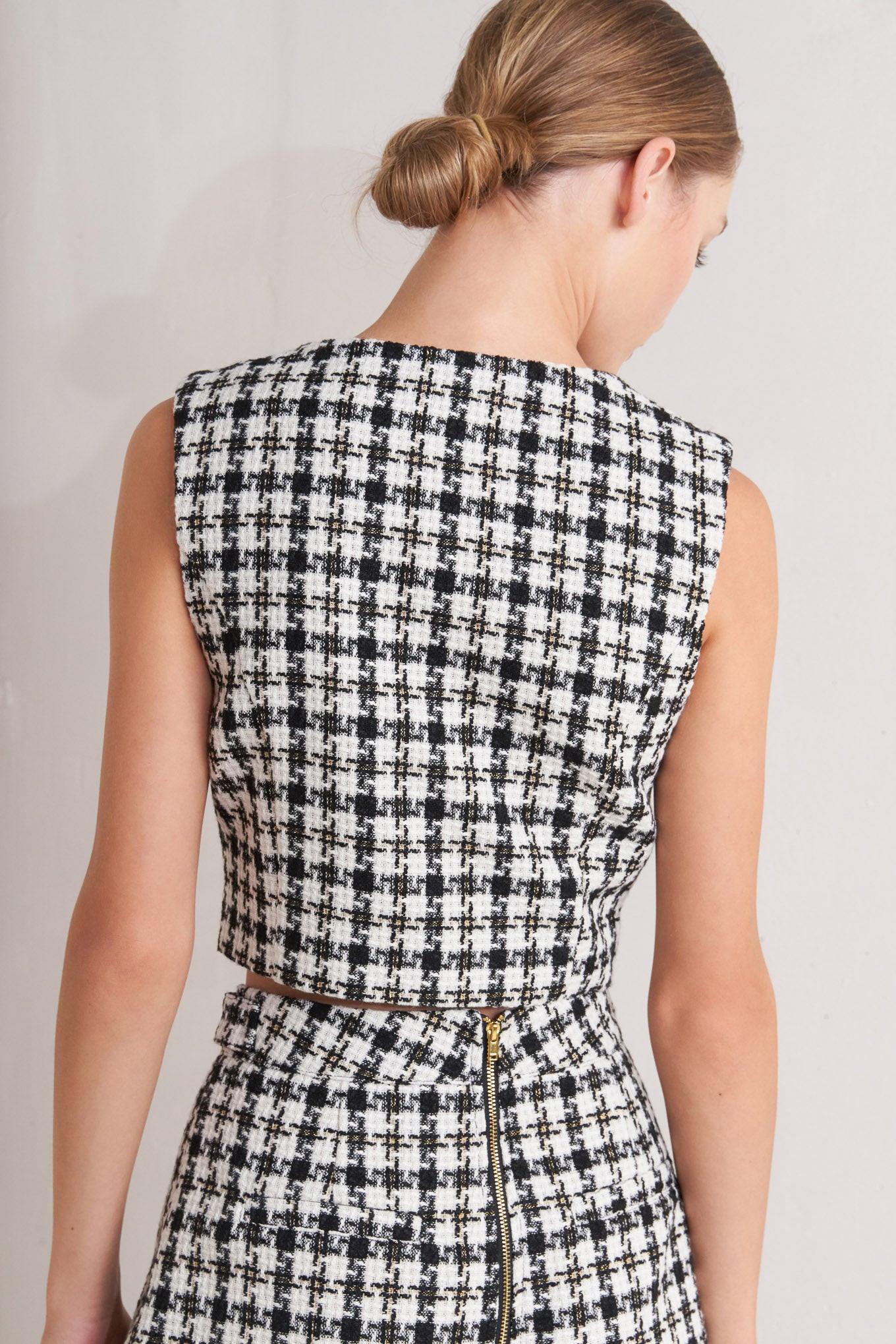 Flying Tomato MONA CHECK TWEED VEST styled on a model, demonstrating its chic appeal and sophisticated layering potential.