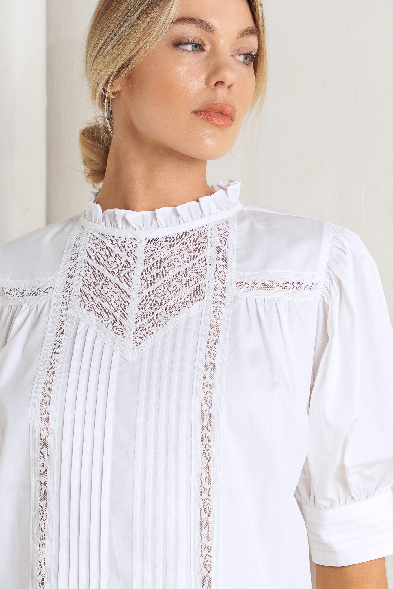 Flying Tomato Pure Poetry Victorian Woven Top worn by a model, showing the side profile and flowy silhouette.