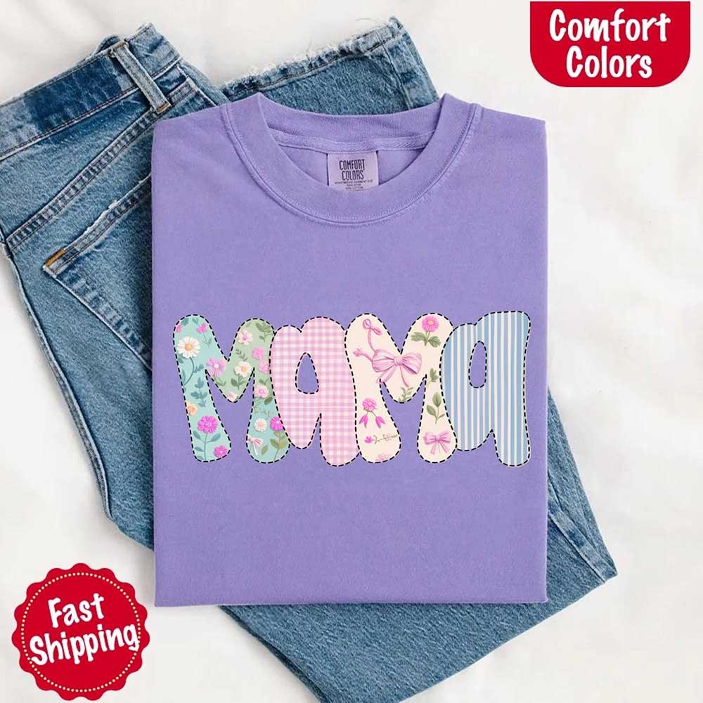 Adorb Custom Tees Floral Mama Comfort Colors Tee in a flat lay, paired with spring accessories, highlighting its versatile st