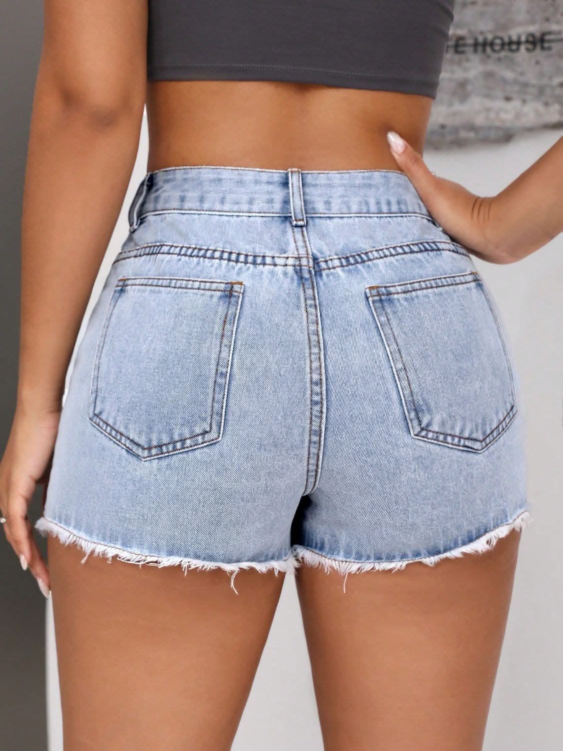 Fringe hem denim shorts with pockets 