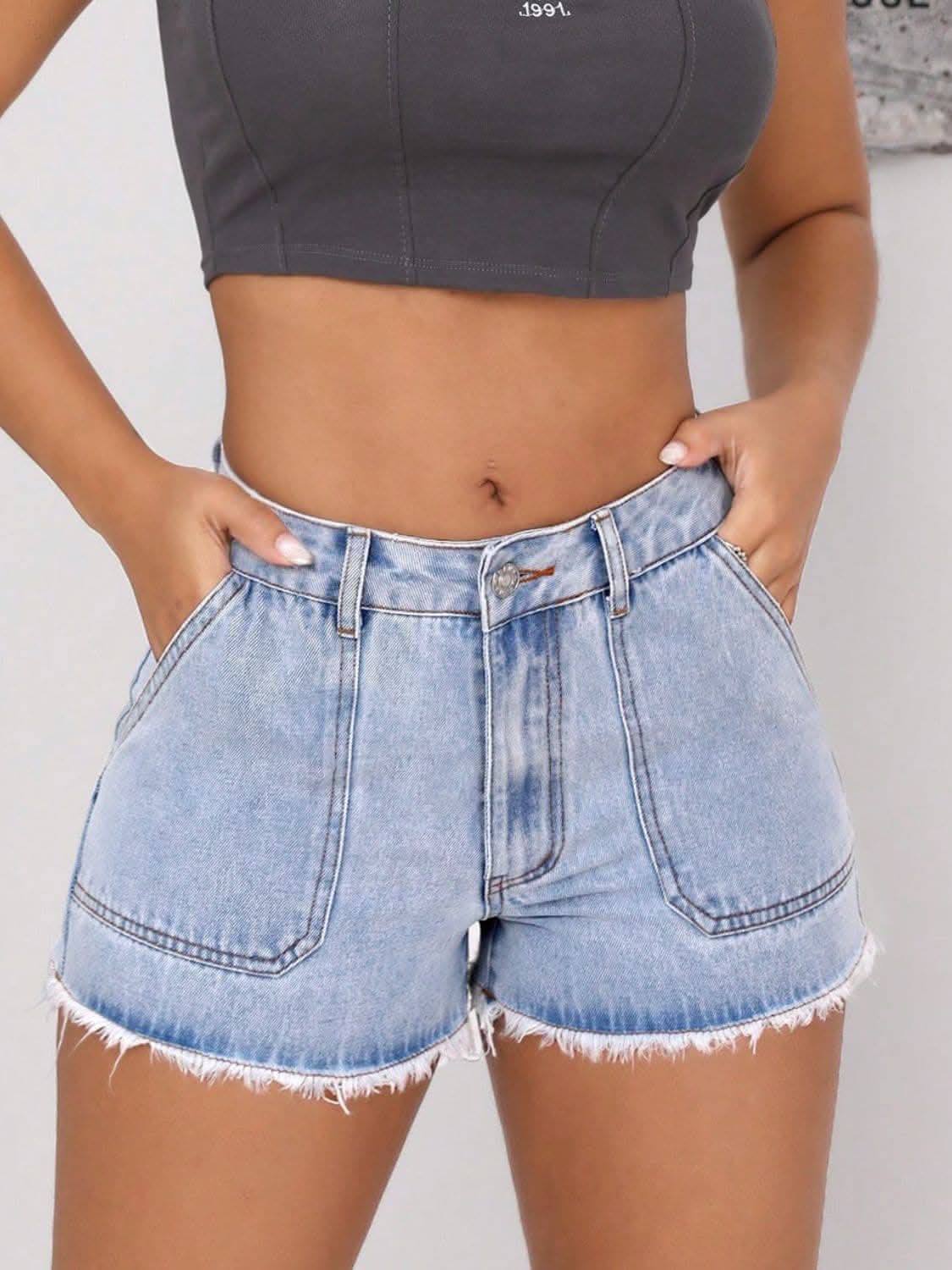 Fringe hem denim shorts with pockets 