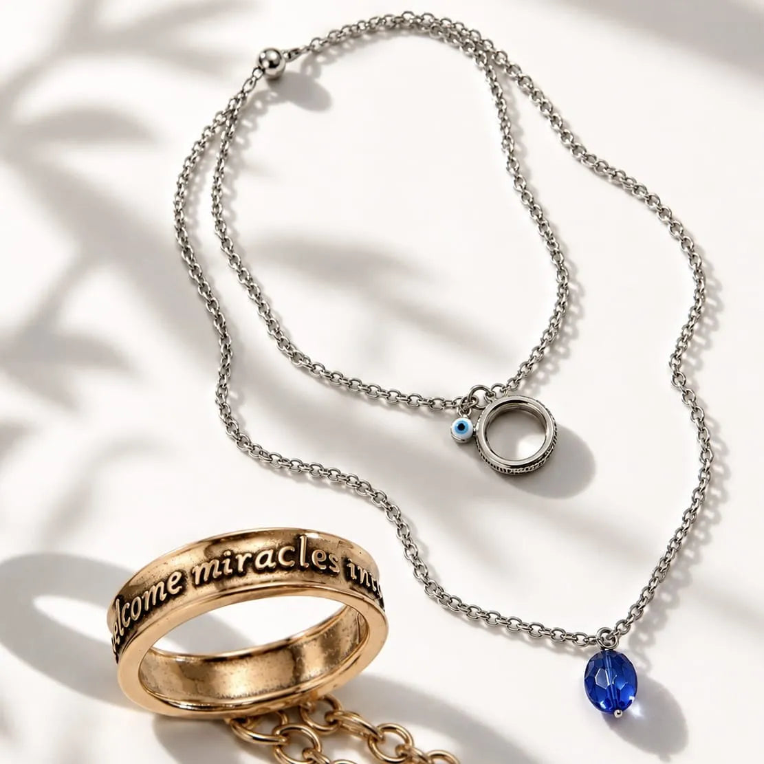 Katia Designs I Welcome Miracles Ring Original Necklace, featuring a prominent Rose Quartz crystal and elegant long chain.