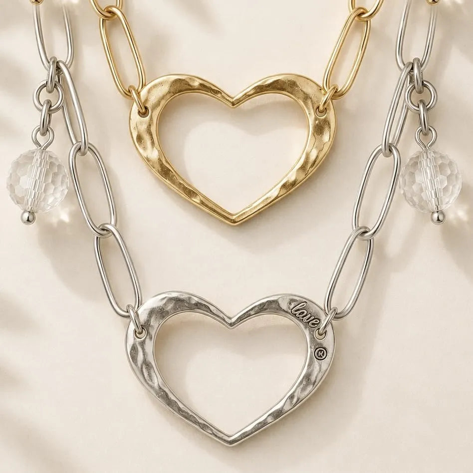 Katia Designs Love Open Heart Long Chain Necklace, featuring an elegant silver-tone open heart pendant on a delicate long cha