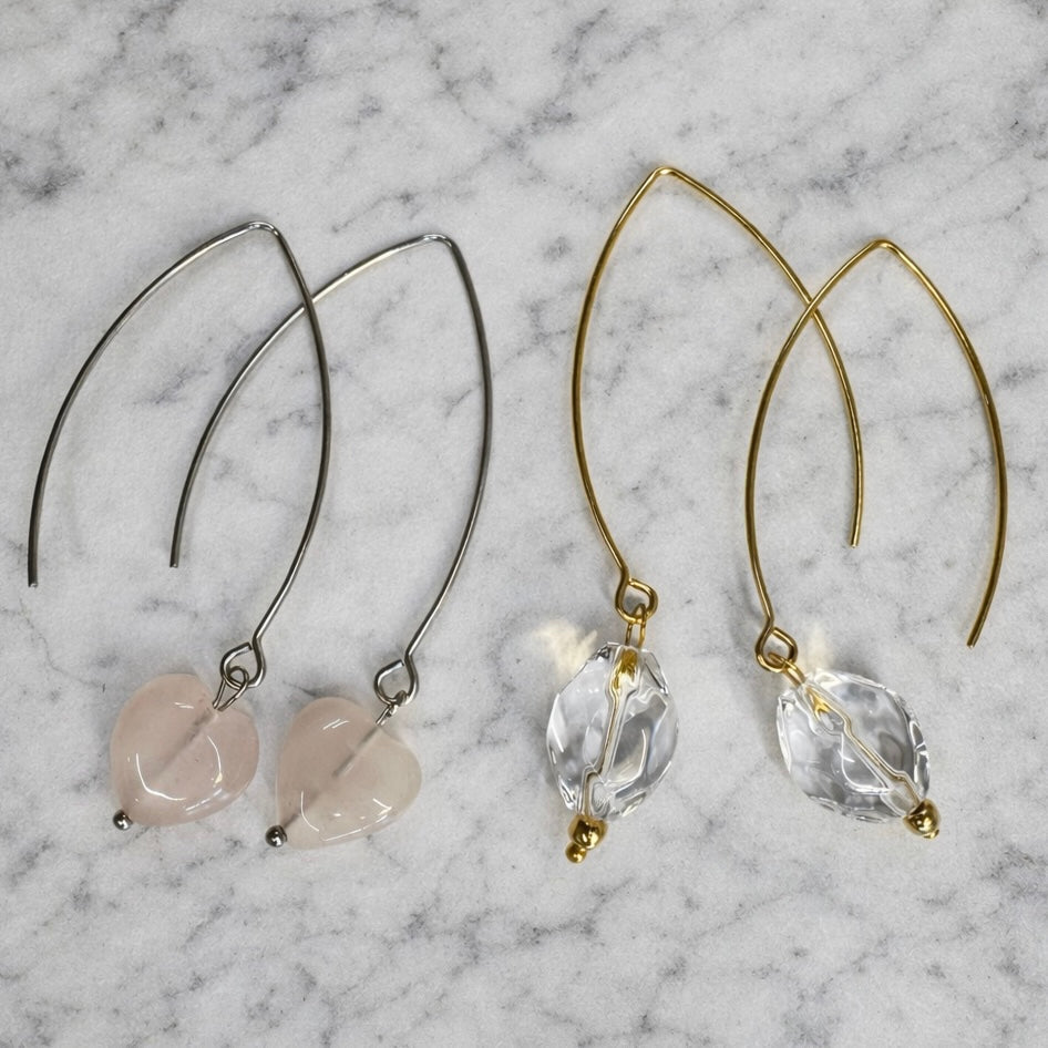 Katia Designs Small Stone Drop Earrings, featuring elegant light blue rose quartz stones on delicate gold-plated hooks.