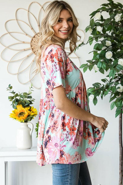 Heimish Full Size Floral V-Neck Short Sleeve Babydoll Blouse 