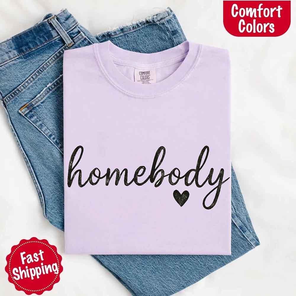Side profile of the Adorb Custom Tees Homebody Comfort Colors Tee, highlighting the relaxed sleeve and comfortable drape.
