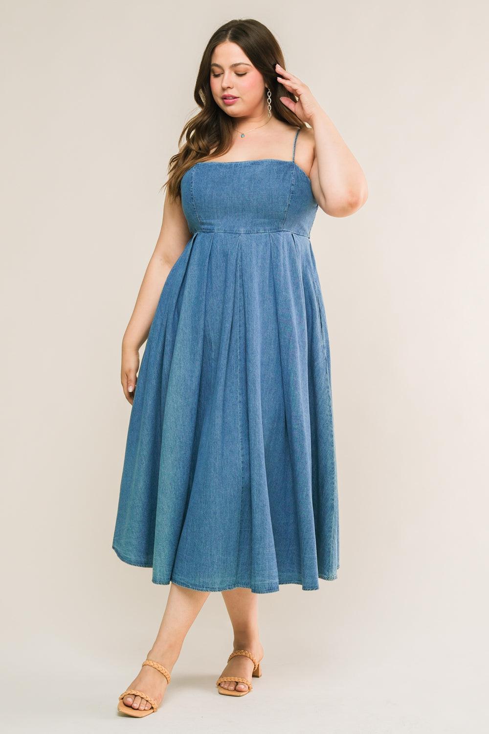Lifestyle shot of the Flying Tomato CAPTIVATING HEART DENIM MIDI DRESS. Model wearing the stylish denim midi dress, showcasin