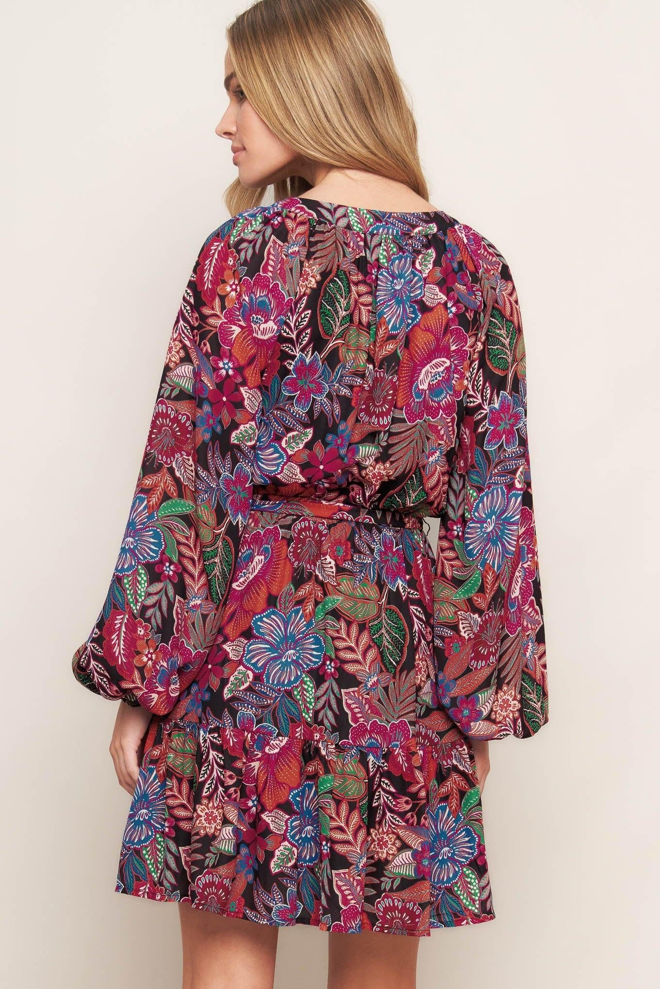 Full back view of the Flying Tomato Floral Bliss Woven Mini Dress, highlighting its elegant drape and design details.
