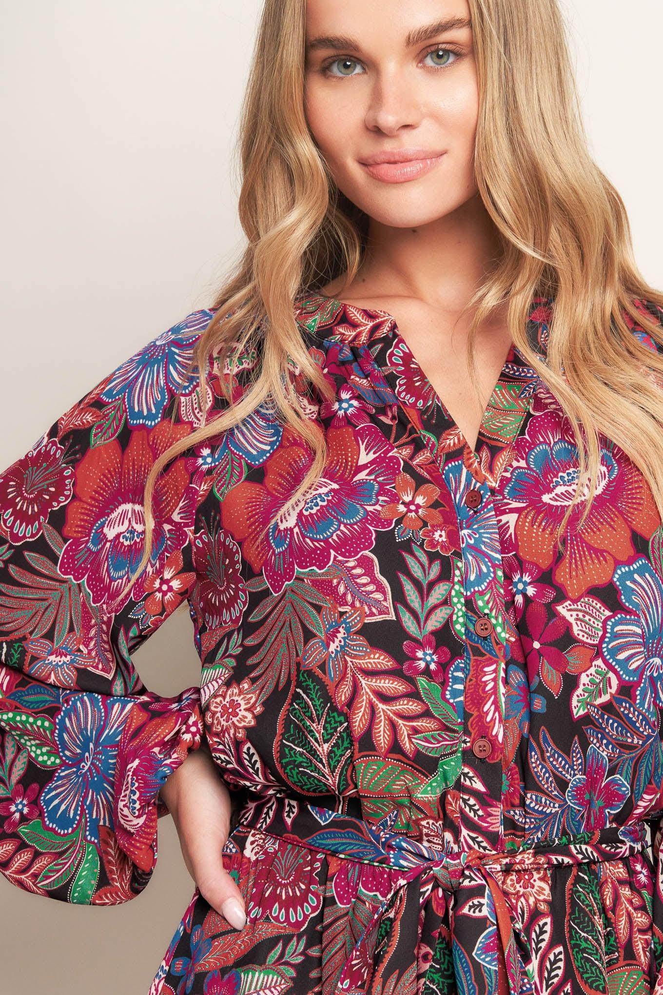 Flying Tomato Floral Bliss Woven Mini Dress, showcasing its flattering silhouette and comfortable fit from a side angle.