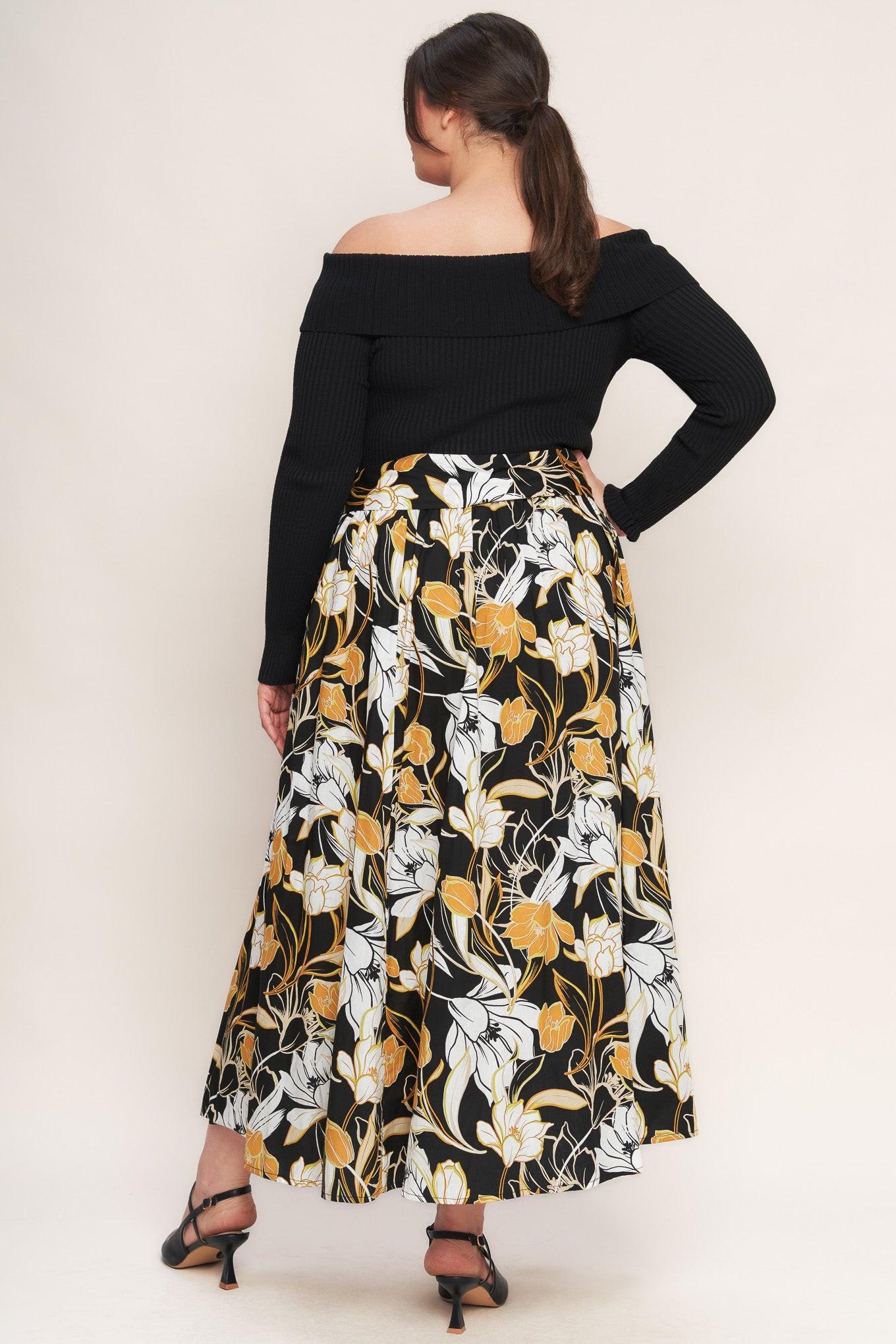 Close-up of the Flying Tomato TWIST ON TIMELESS WOVEN MIDI DRESS hemline, illustrating its elegant midi length and flow.