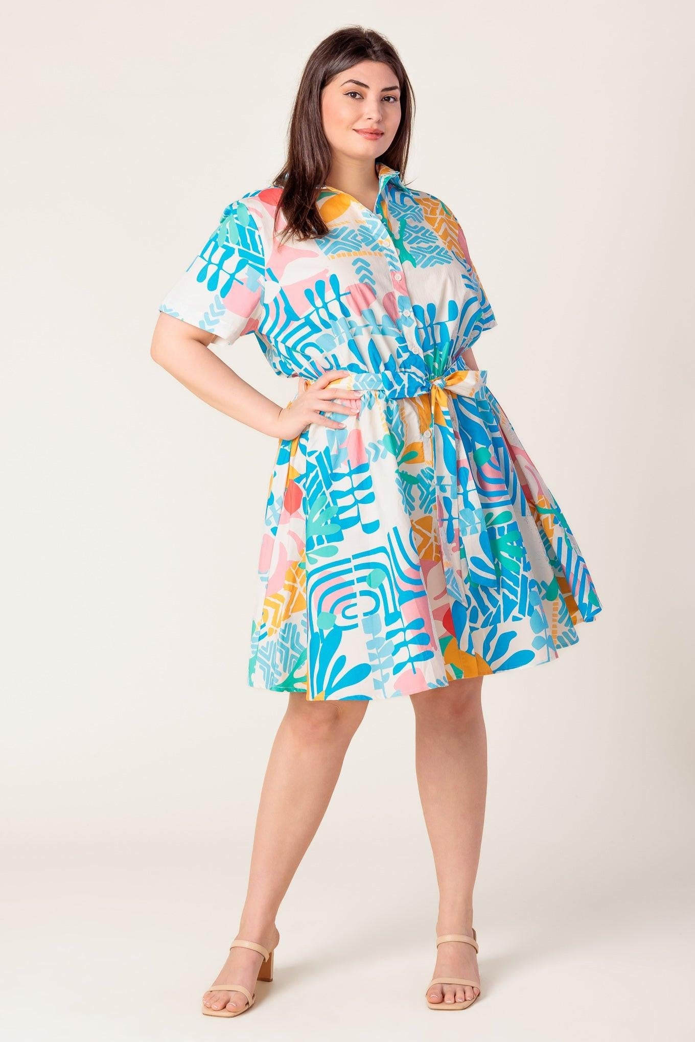 Lower section of the Flying Tomato Garden Social Woven Mini Dress, highlighting the mini length and refined hemline detail.