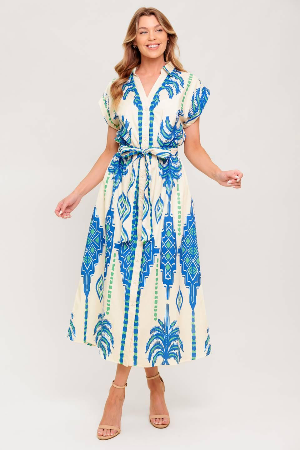 Back view of the Flying Tomato SOFTLY SPOKEN BLUE WOVEN MIDI DRESS, emphasizing the graceful drape and comfortable fit.