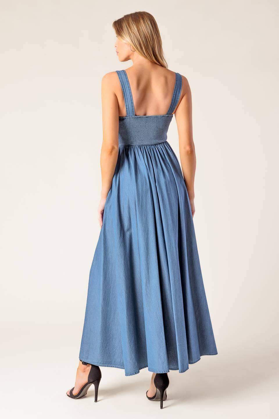 Detail shot of the Flying Tomato PASSIFLORA INDIGO DENIM MIDI DRESS fabric, emphasizing the rich indigo color and durable den