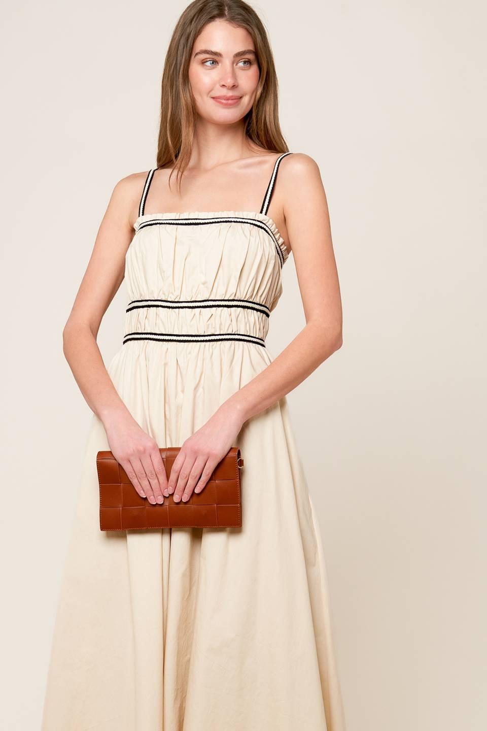 Back view of the Flying Tomato Terrific Timing Cream Woven Midi Dress, highlighting the graceful drape and design.