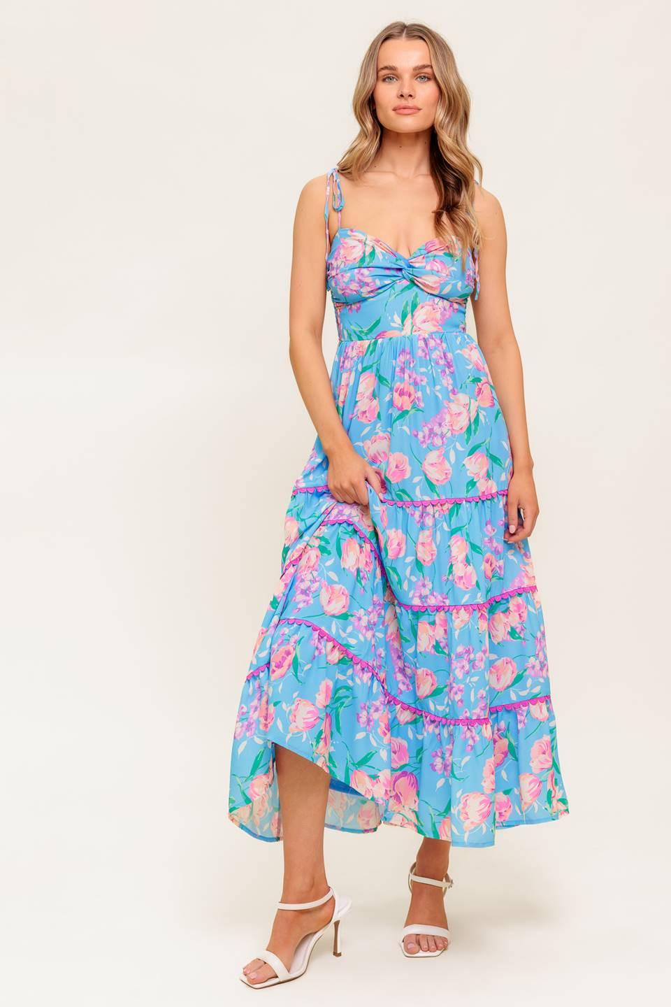 Rear view of the Flying Tomato Soft Bloom Blue Woven Midi Dress, showing the elegant back design and comfortable midi length.