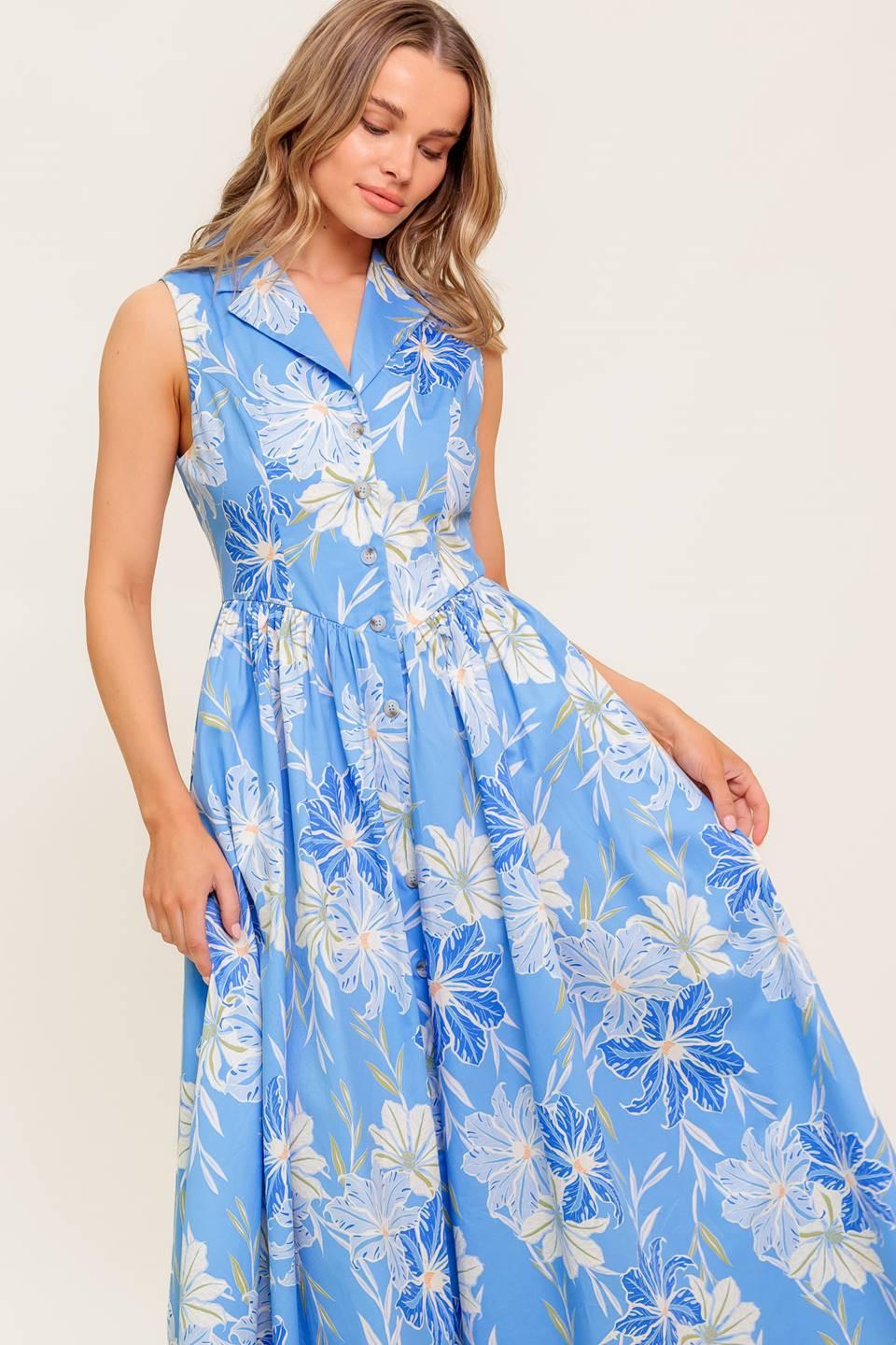 Model wearing the Flying Tomato Fern Whisper Blue woven midi dress, demonstrating its comfortable fit and graceful movement.