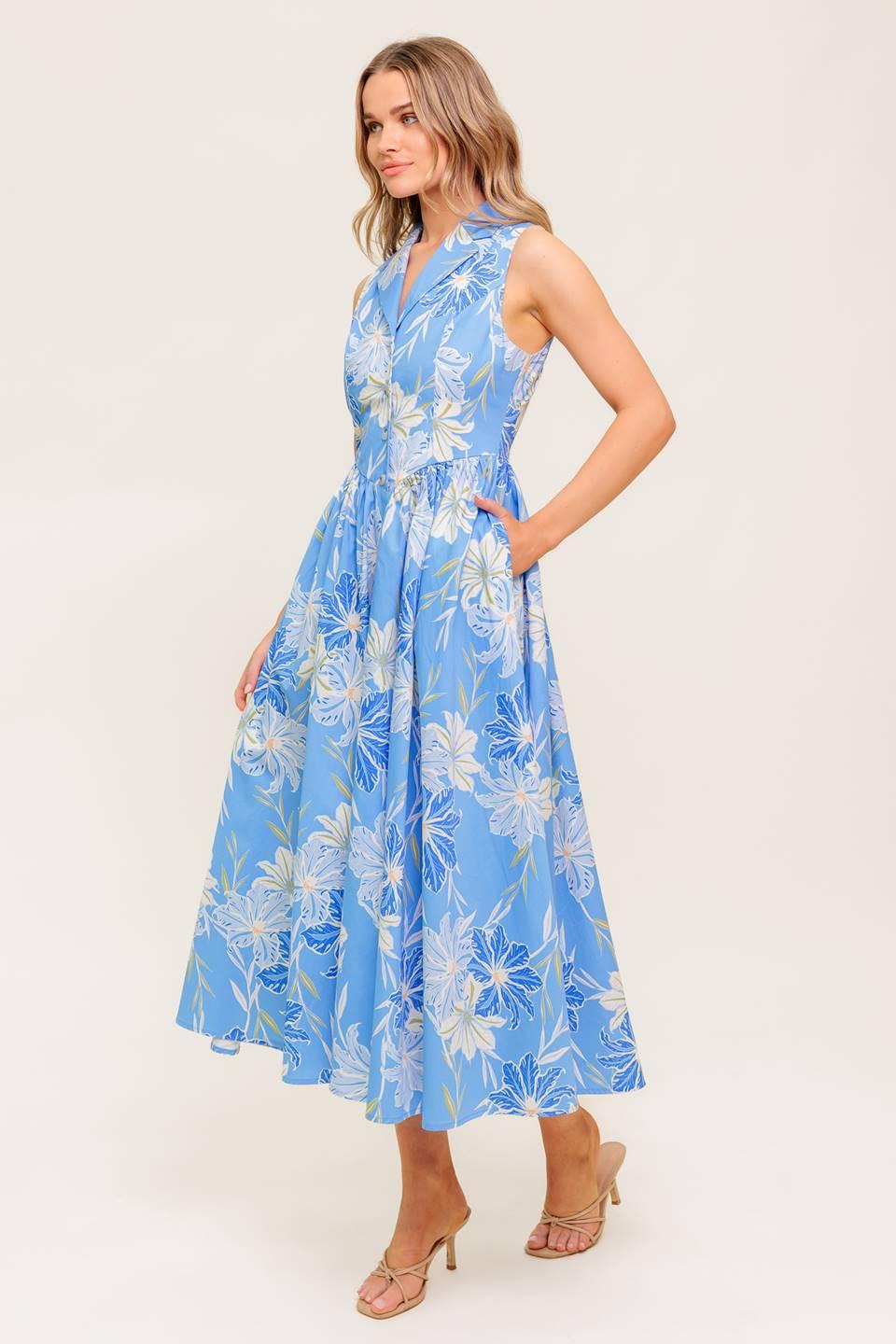 Detailed view of the quality woven fabric on the Flying Tomato Fern Whisper Blue midi dress, emphasizing its craftsmanship.