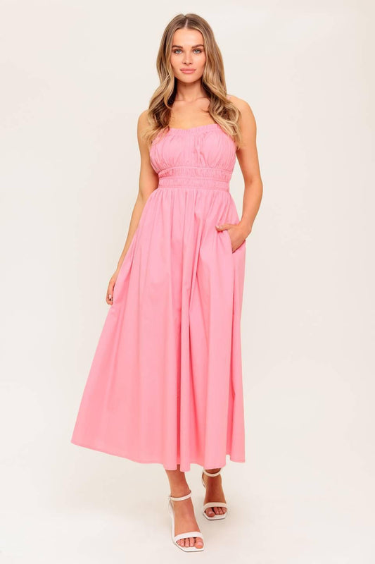 Flying Tomato Honey Sunset Pink Woven Midi Dress shown from the front, featuring a flattering V-neck and flowing A-line skirt