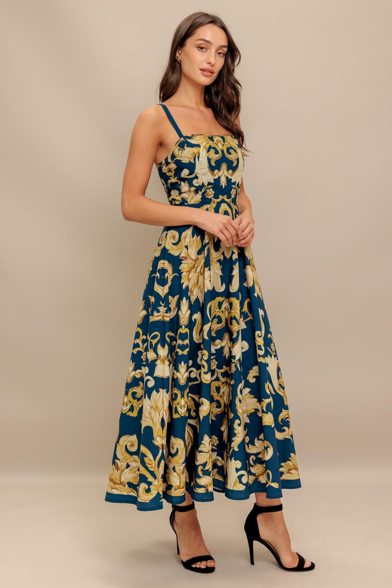 Flying Tomato Imperial Bloom Blue Woven Midi Dress worn by a model in a relaxed setting, perfect for versatile everyday wear.