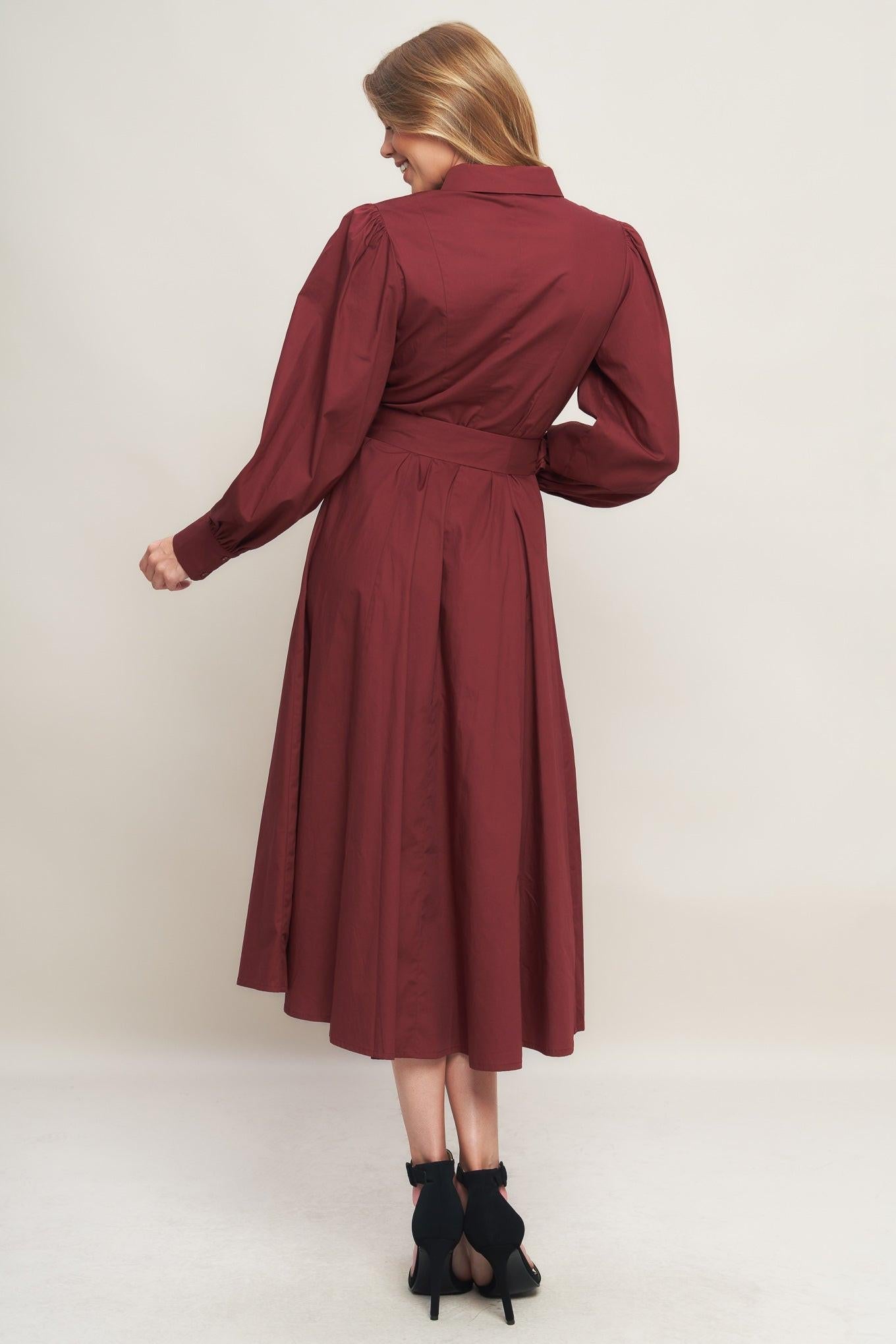 Close-up of the Flying Tomato Modern Femme Burgundy Woven Midi Dress fabric, highlighting its intricate texture.
