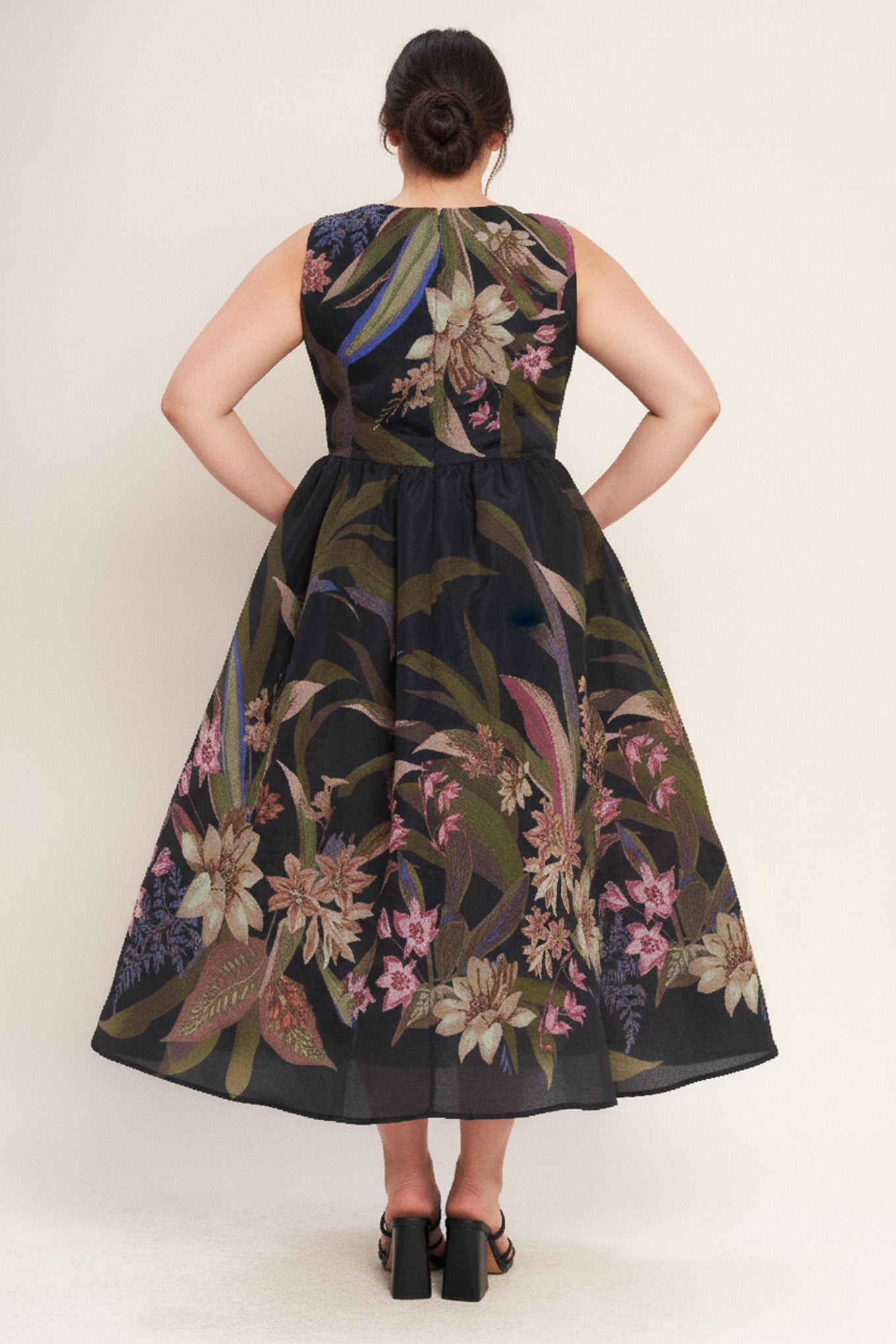 Flying Tomato Foliage Whisper Dress: Model wearing the midi dress, showcasing its flowy silhouette.