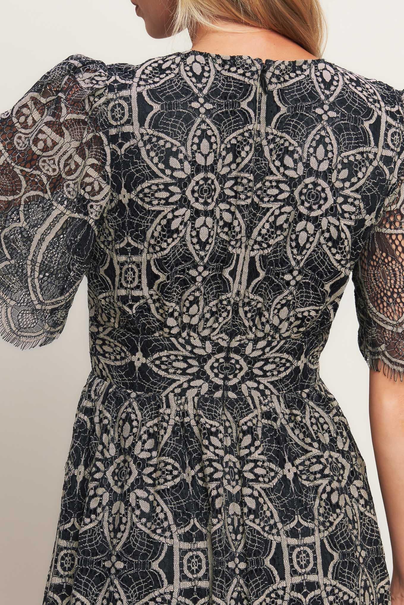 Back view of the Flying Tomato Gothic Bloom Woven Lace Midi Dress, showcasing its elegant design and graceful drape.