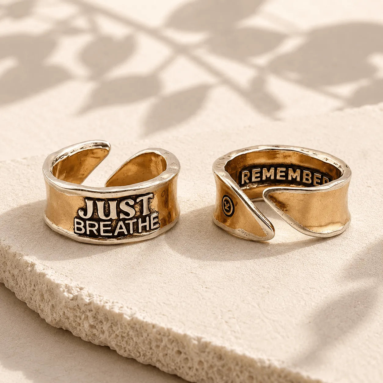 Katia Designs Just Breathe Remember Adjustable Ring, a stylish silver-tone piece for everyday wear, promoting mindfulness.