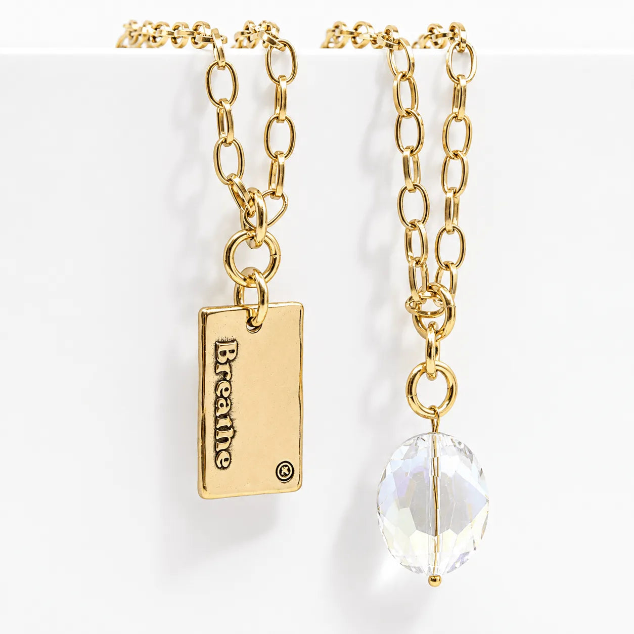 Katia Designs Breathe Original Lite Necklace, a detailed shot of the unique aqua quartz crystal's natural facets.