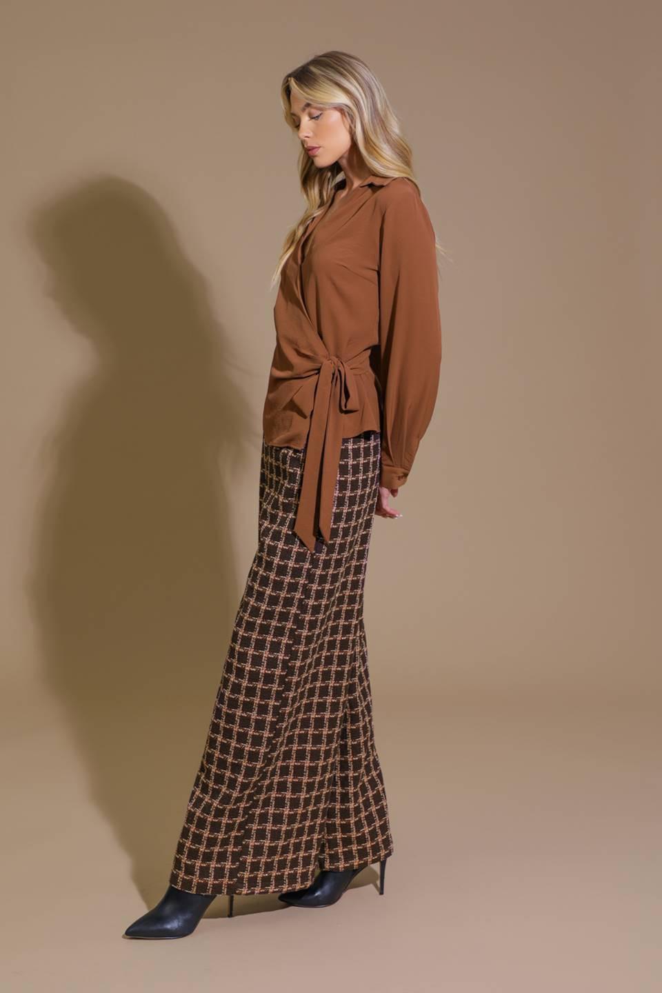 Close-up of the Flying Tomato SHOW YOU OFF TWEED PANTS, revealing the rich, intricate texture of the fabric and refined butto