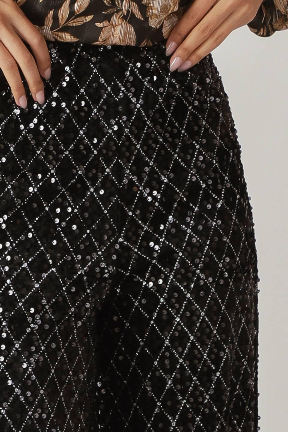 Close-up of Flying Tomato Running Out of Time Sequin Pants, highlighting the intricate sparkling texture.