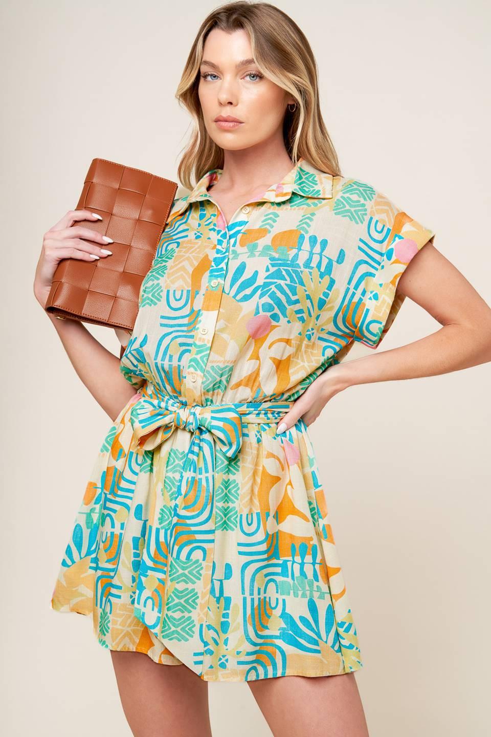 The breathable woven fabric of the Flying Tomato Something Special Romper, emphasizing its soft feel and durable construction