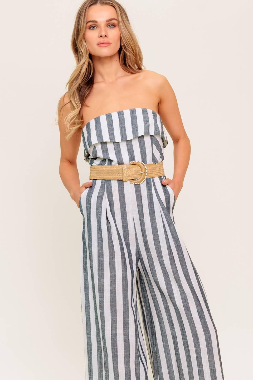 Back view of the Flying Tomato URBAN SOUL WOVEN JUMPSUIT, emphasizing the open back design and flowing wide-leg silhouette.