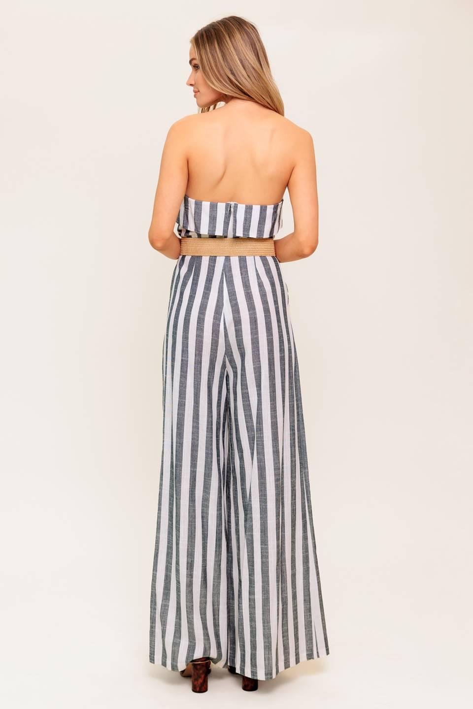 Detail shot of the Flying Tomato URBAN SOUL WOVEN JUMPSUIT's fabric texture and subtle stitching, highlighting quality.