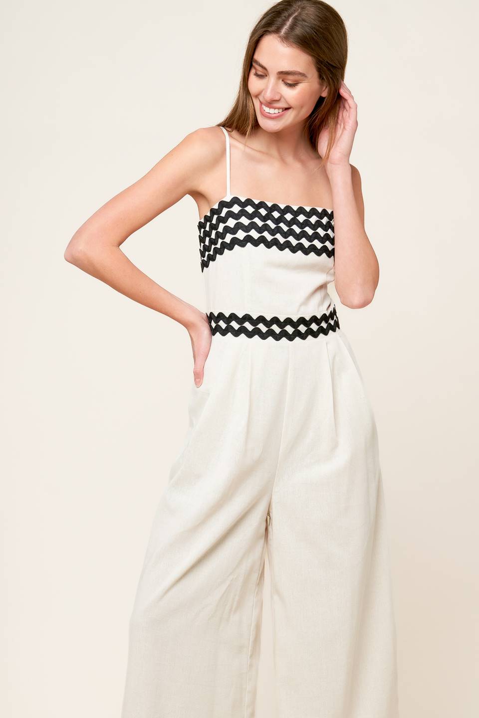 MEET AT THE PIER CREAM WOVEN JUMPSUIT Flying Tomato