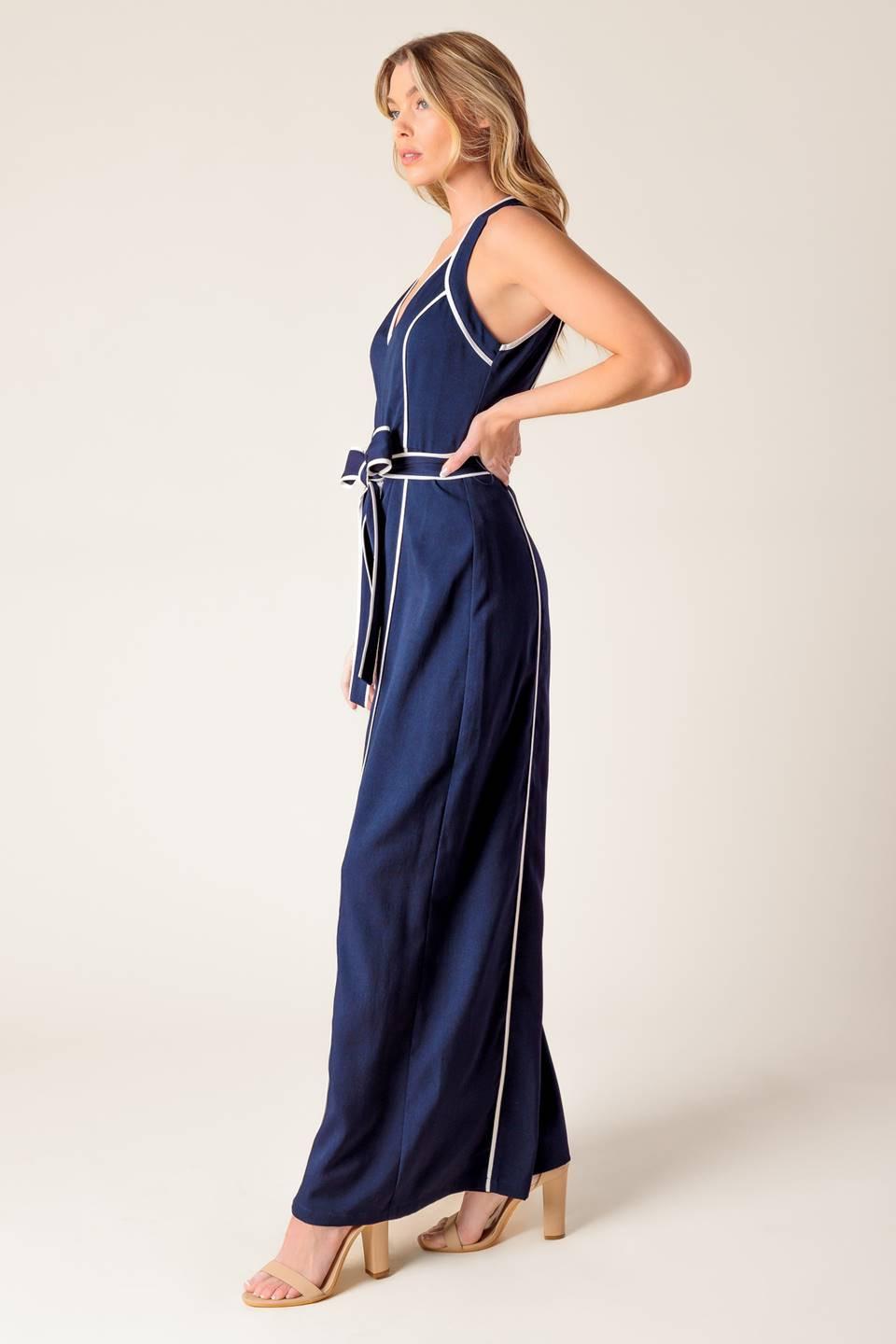 Model wearing the Flying Tomato Layton Navy Woven Jumpsuit, illustrating its comfortable fit and versatile appeal.